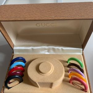 Gucci interchangeable watch pieces. Includes box